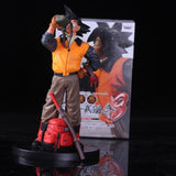 Achetez dès maintenant cette Figurine statuette de 23cm de Son Goku édition limitée dans une superbe tenue de voyage buvant dans sa gourde