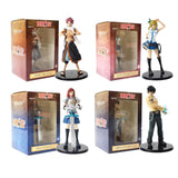Lot de 4 figurines statuettes Fairy Tail (Natsu, Lucy, Erza, Gray)