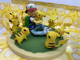 Figurine statuette Pokémon de Sacha & Pikachu